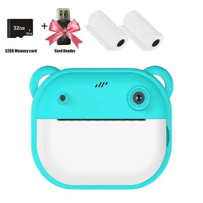 Children's digital camera in turquoise with accessories, including a 32GB memory card and card reader for instant printing.