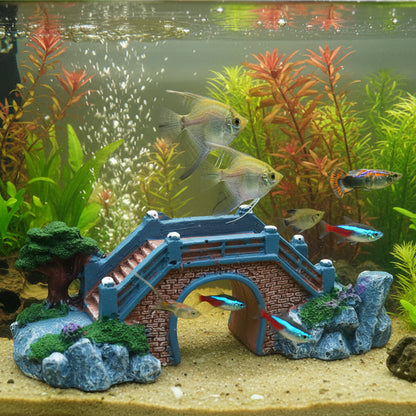 Decorative miniature bridge with trees and rocks 