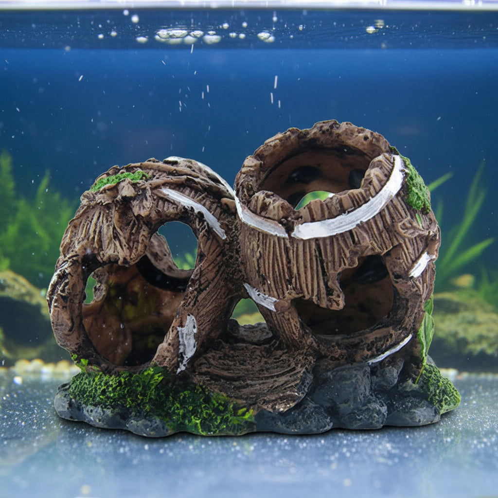 Decorative aquarium rock formation with moss